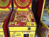 three machines sitting next to each other on the floor