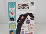 La boîte de la montre connectée est posée sur la table.