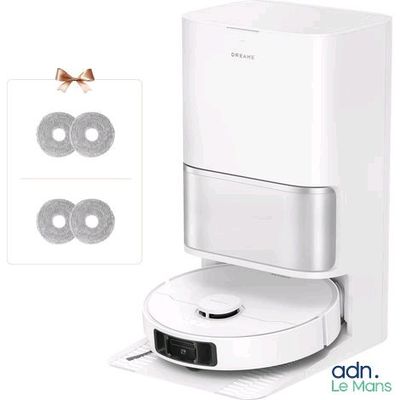a picture of a white machine that is connected to a wall