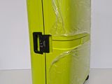 two pieces of luggage wrapped in plastic on a white surface
