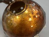 a vase that is sitting on top of a table