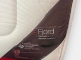 a close up of a mattress with a label on it