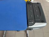 a machine that is sitting on top of a blue table