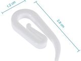 a close up of a pair of white plastic hooks on a white background