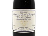 a bottle of wine that is sitting on a table