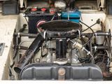 a small engine in the back of a truck