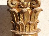a gold column with a decorative design on it