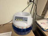 a small machine that is sitting on a table