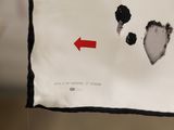 a picture of a piece of paper with a red arrow on it