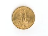 an image of a gold coin on a white surface