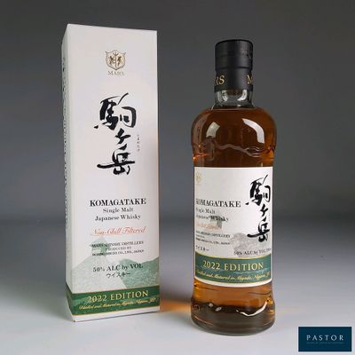 an image of a bottle of japanese whisky next to a box