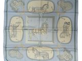 blue and yellow silk scarf with a picture of a horse and carriage