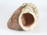 a small piece of pottery that is sitting on a white surface