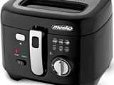 a close up of a black toaster on a white background