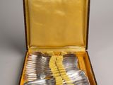 a box with a set of silverware in it