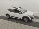 a picture of a white car parked in a garage