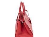 a red leather handbag on a white background