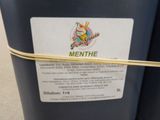 a close up of a blue container with a label on it