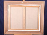 an image of an easel with a painting on it and a blue background