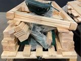 a pile of wood sitting on top of a pallet