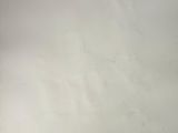 a picture of a white refrigerator freezer in the kitchen