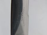 a close up of a knife that is on a table