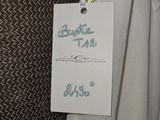 a picture of a label on a dress hanging on a hanger