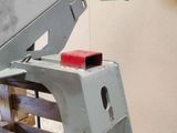 a machine that is sitting on top of a wooden table