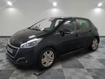 a picture of a black car parked in a garage