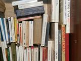 a book shelf with many books on it
