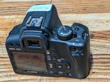 a camera that is sitting on a wooden table