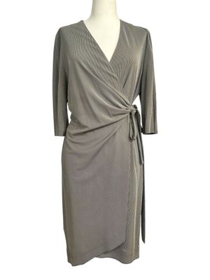 a women ' s dress with a wrap around the waist