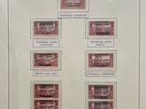 an image of a picture of a collection of stamps in a frame