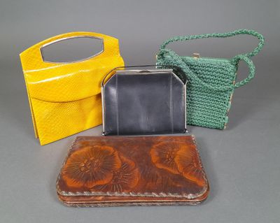 three purses that are sitting on a table