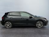 the volkswagen e - golf is parked in a grey room