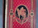 un vieux livre rouge avec l'image d'un homme à cheval