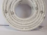 a white hose that is on a white surface