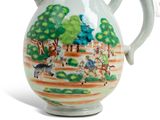 a white pitcher with a painting on the side of it