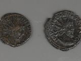 two ancient roman coins, one of which has a lion head and the other of which is a lion head
