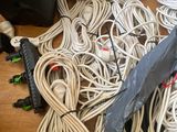 a lot of wires and cords that are on the floor