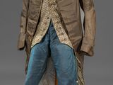une photo d'une veste et d'un pantalon pour homme posés sur un mannequin
