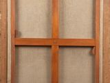 an old wooden window frame with four panes of glass in it