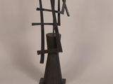 an image of a sculpture made out of metal sticks and sticks