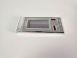 a picture of a cell phone on a white surface