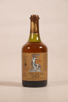 bottle of wine sitting on a white surface with a white background