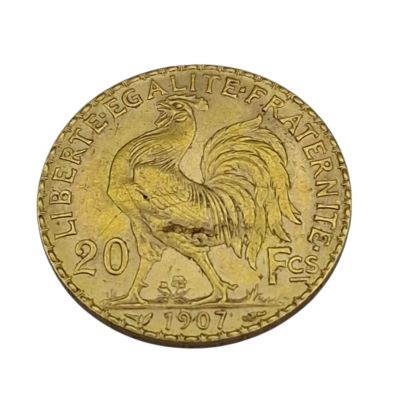 l'image d'une pièce d'or ornée d'un coq
