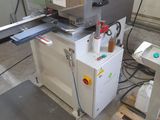 a machine that is sitting on a pallet in a room