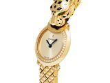 an image of a woman ' s wrist watch with a leopard head