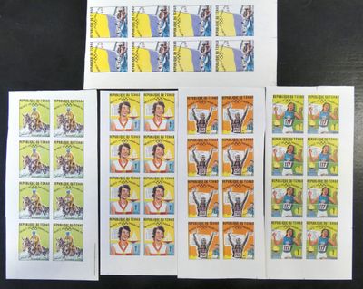 four different stamps with a picture of a man and a woman on them