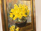 a painting of yellow flowers in a vase on the wall